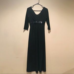 Long black dress with attached belt.